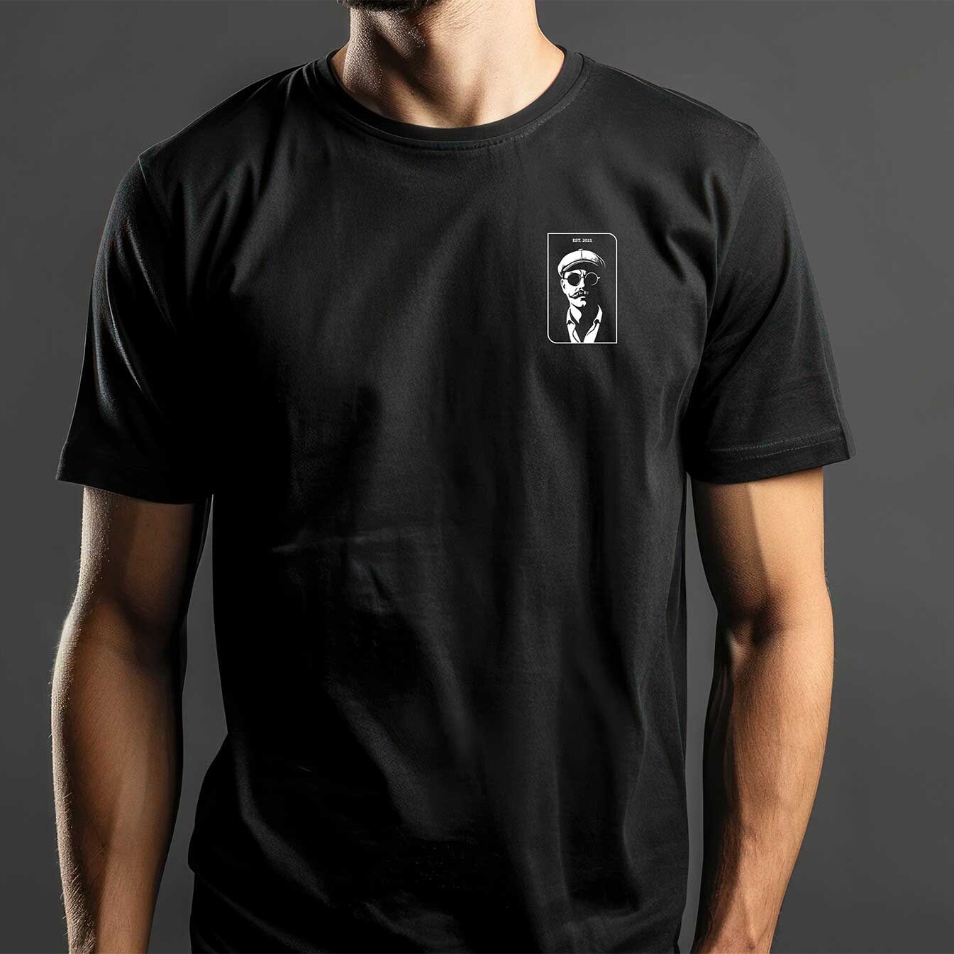 Black t-shirt mockup with The Craftsman portrait logo applied on the chest area