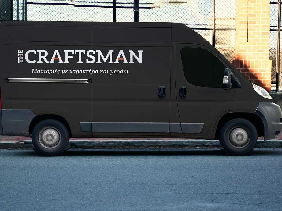 Black delivery van featuring The Craftsman logo and tagline applied on the side panel